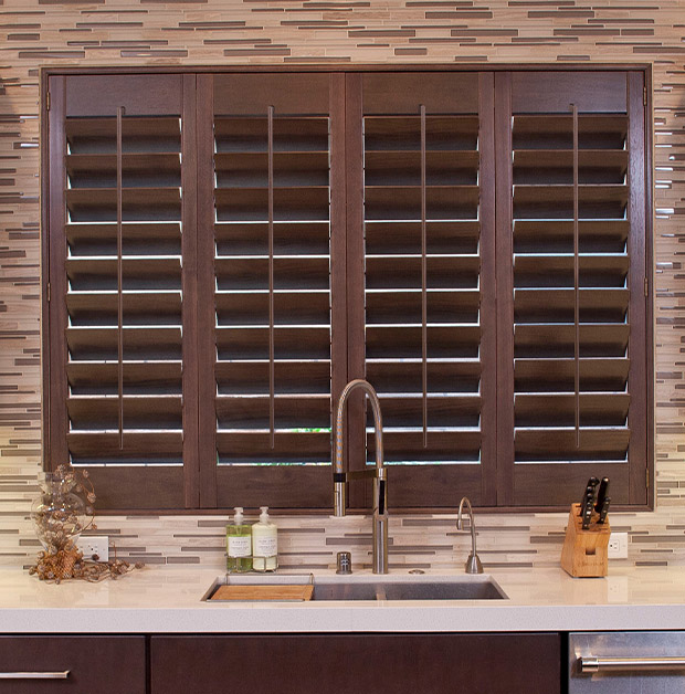 Ovation shutters above a kitchen sink